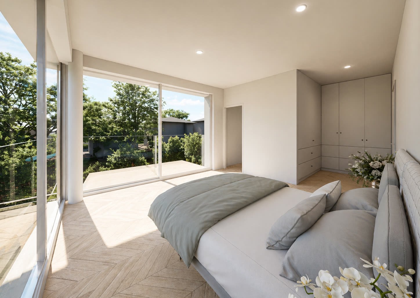 Suite parentale de la villa A, lit face au jardin et balcon privatif